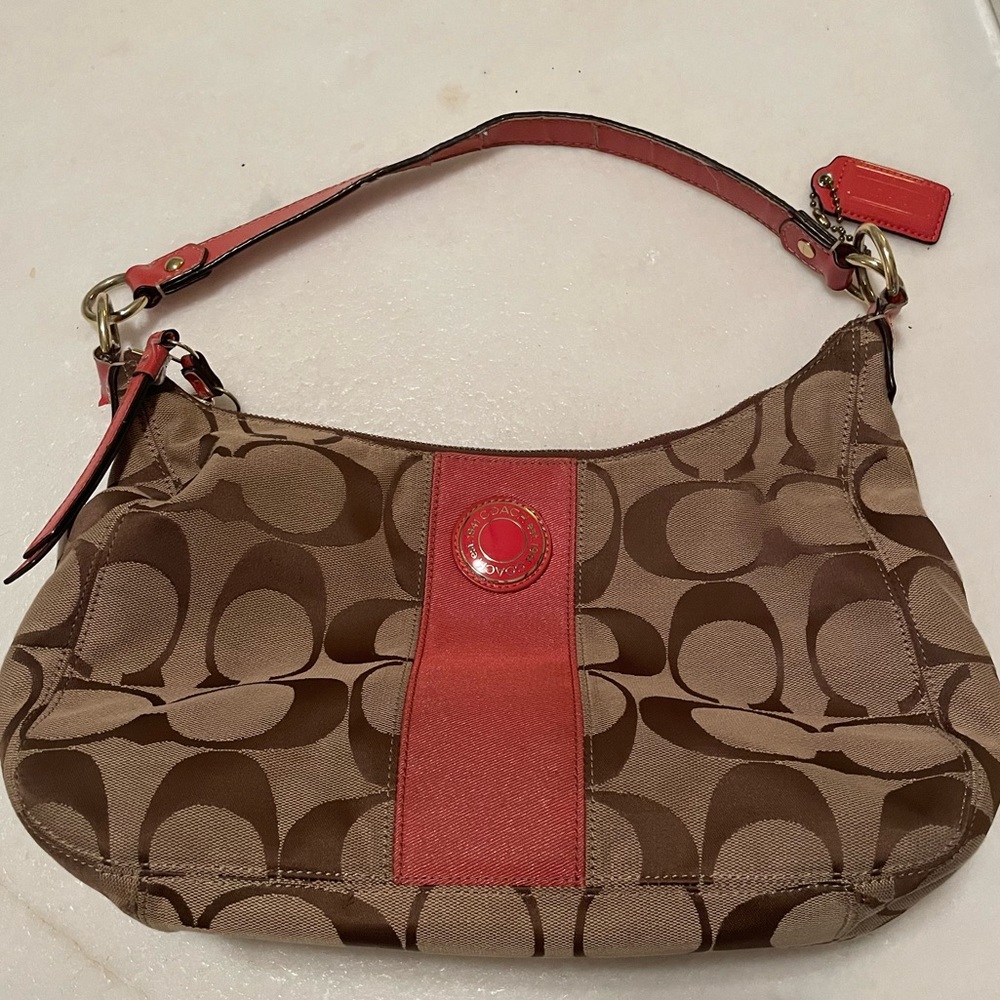 Coach signature hobo with orange accents